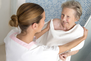 caregiver taking care of her client